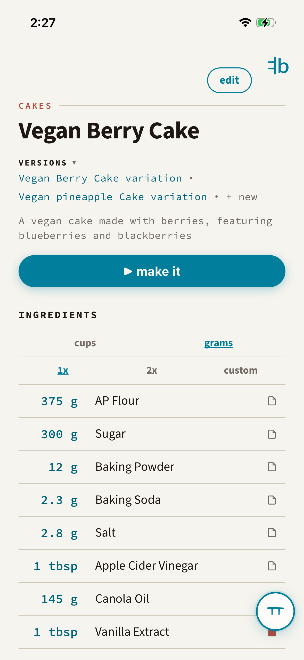 A recipe screen: Vegan Berry Cake, with a versions row listing two variations, and an ingredients table with cup and gram toggles.